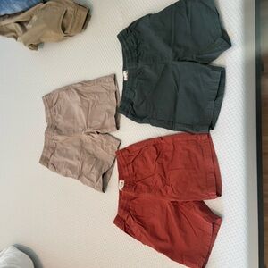 Pact Men's Hybrid Shorts in Rust, Olive, and Taupe